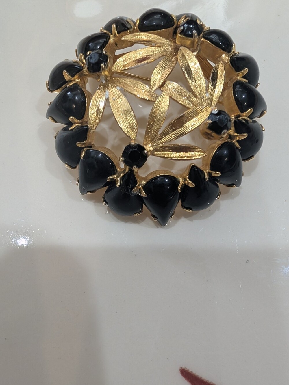 Gold-Tone Black Stone Floral Brooch